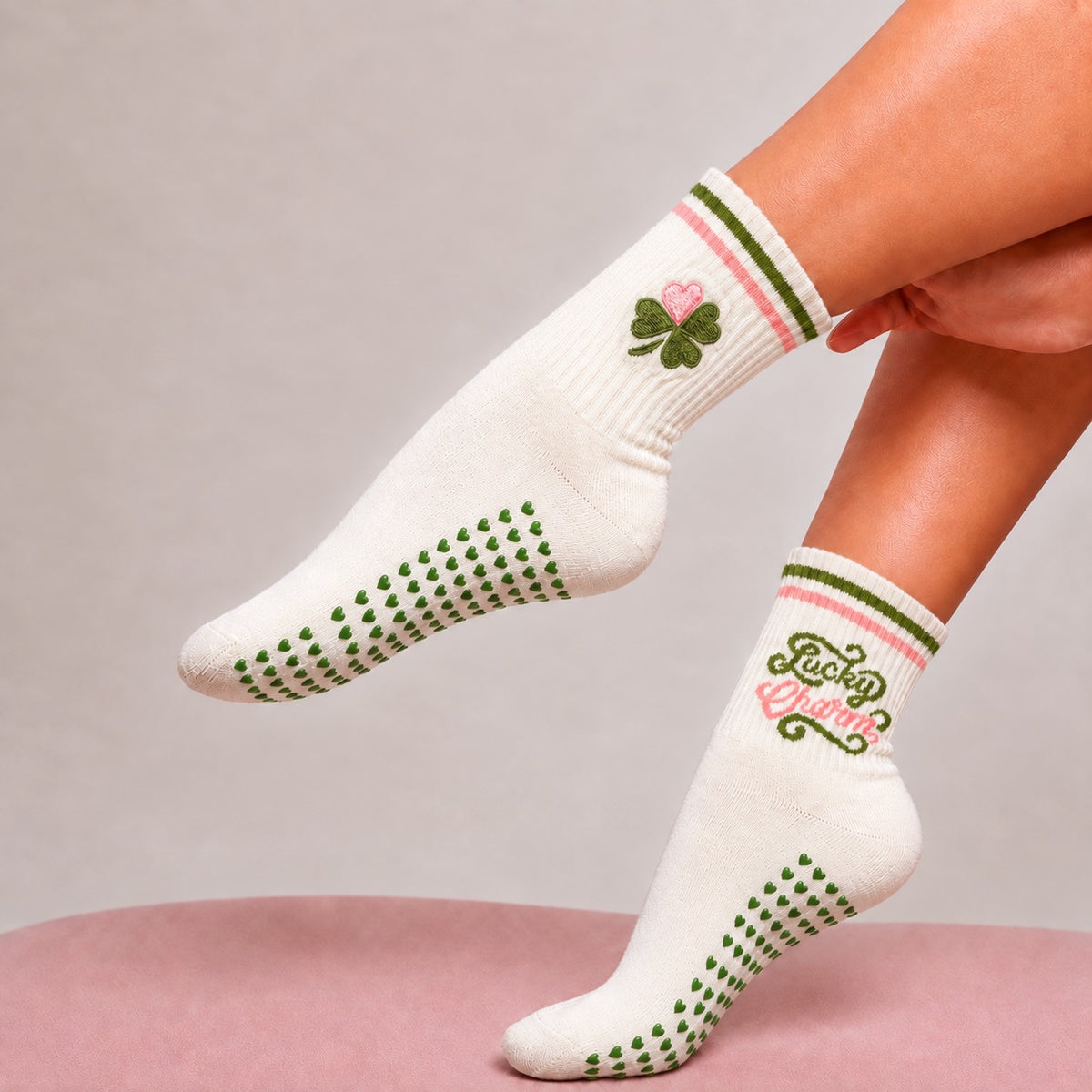 Lucky Charm Grip Socks in white with green heart grips and pink-and-green jacquard details